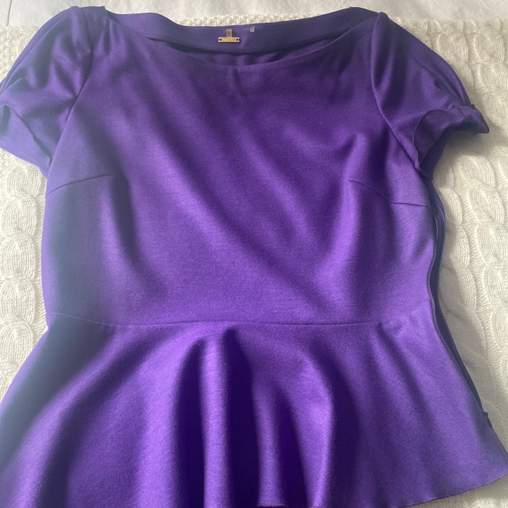 Top with peplum